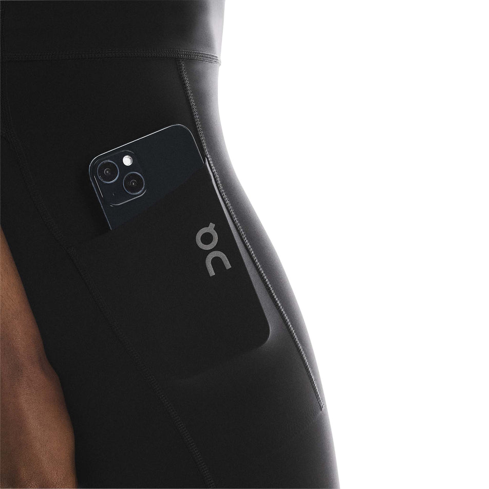 The stash pocket on the side of the On Women's Performance Tights in the Black colourway.