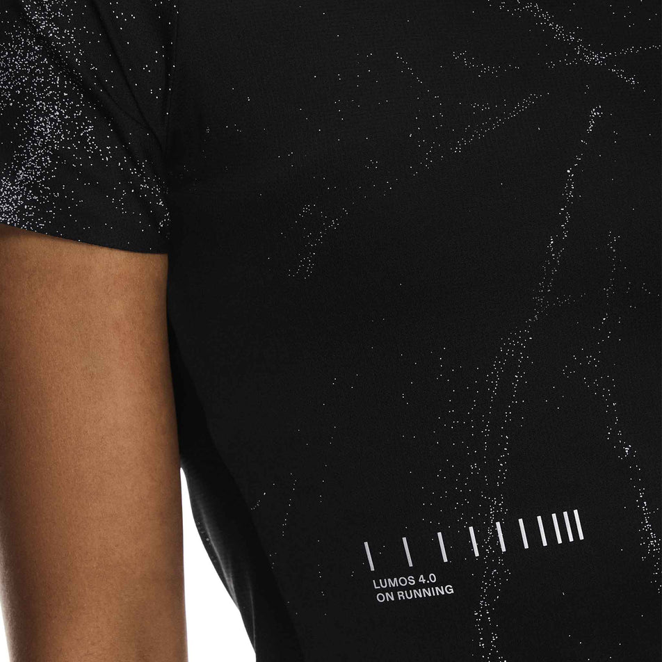 Close-up view of the back of the On Women's Performance-T Lumos in the Black colourway. (8790019342498)