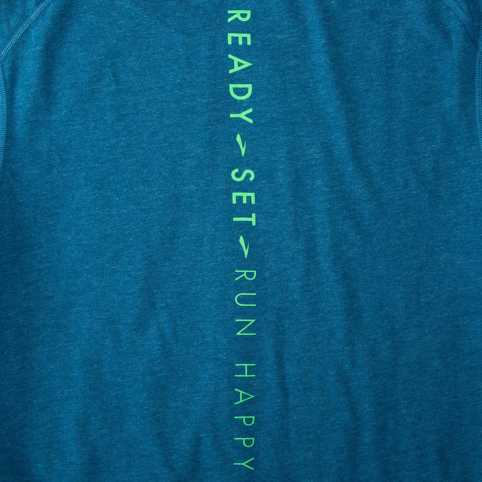 The Ready Set Run Happy callout on the back of a Brooks Men's Distance Short Sleeve 2.0 Running T-shirt in the Heather Dark Ocean/Ready Set Run Happy colourway (8007464091810)