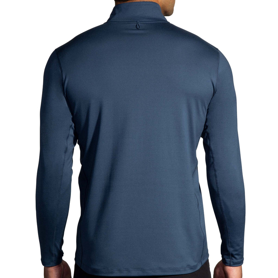 Back view of a model wearing the Brooks Men's Dash 1/2 Zip 2.0 in the Blue Slate colourway. (8575022923938)