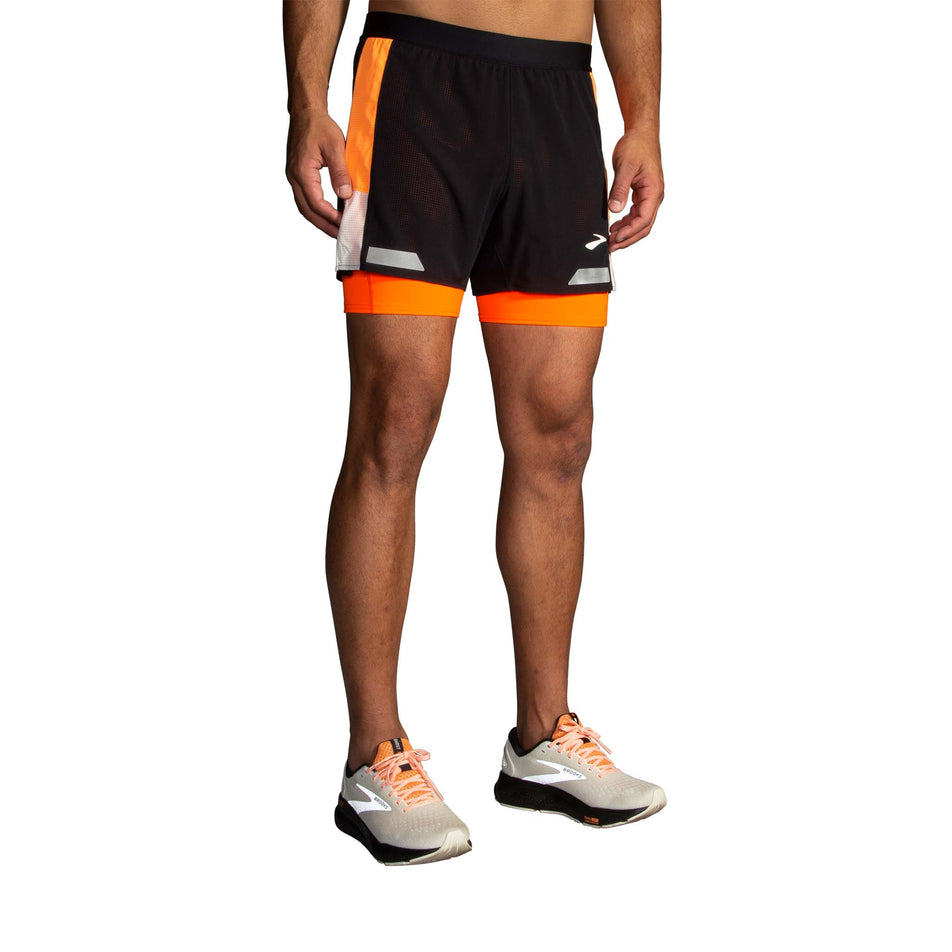 Front view of a model wearing the Brooks Men's Run Visible 5