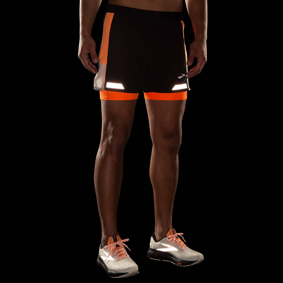 Front view of a model wearing the Brooks Men's Run Visible 5