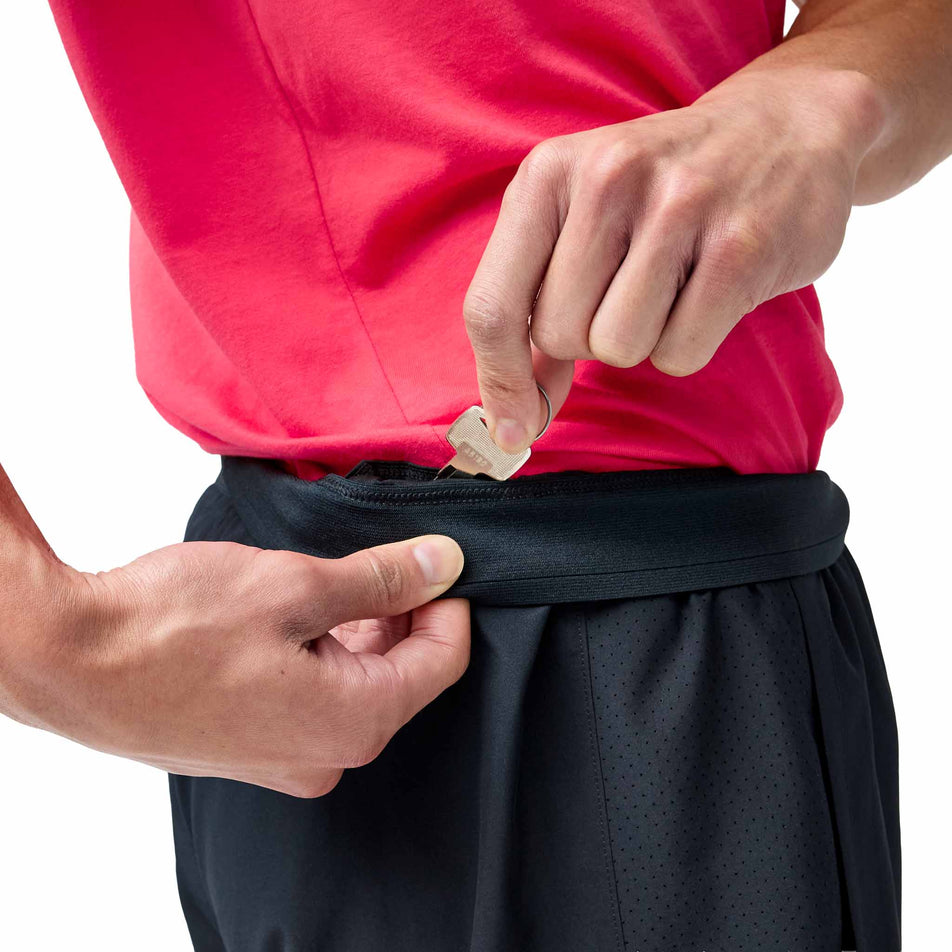 The internal pocket on the Brooks Men's Dash Shorts in the Black colourway.