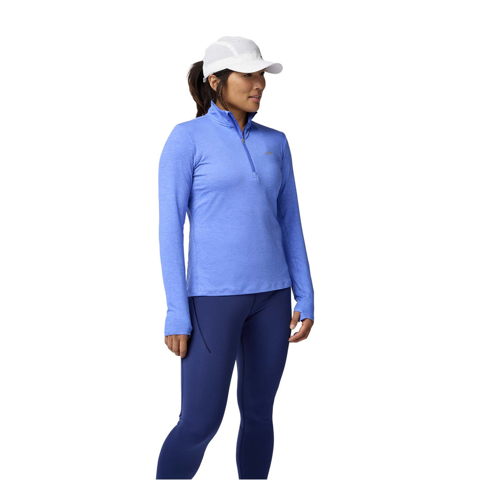 Front view of a model wearing the Brooks Women's Dash 1/2 Zip 2.0 in the Htr Bluebell colourway. (8575029280930)