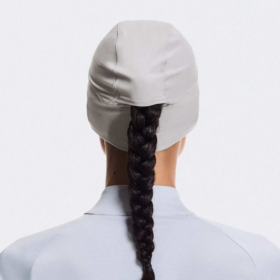 Back view of a model wearing the On Core Beanie in the Alloy colourway.