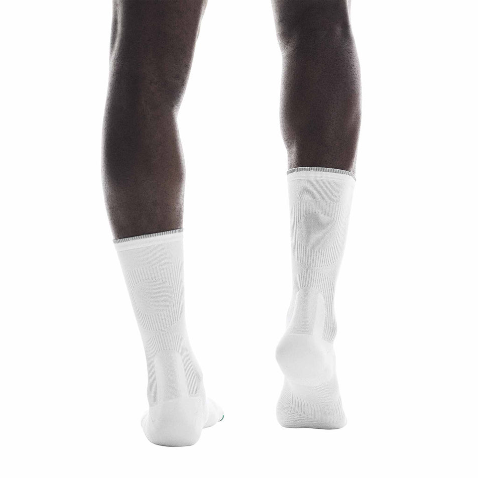 The On Running Socks that come with a pair of On Unisex Cloudmonster 3 Hyper LS Running Shoes in the Limelight/Bloom colourway.