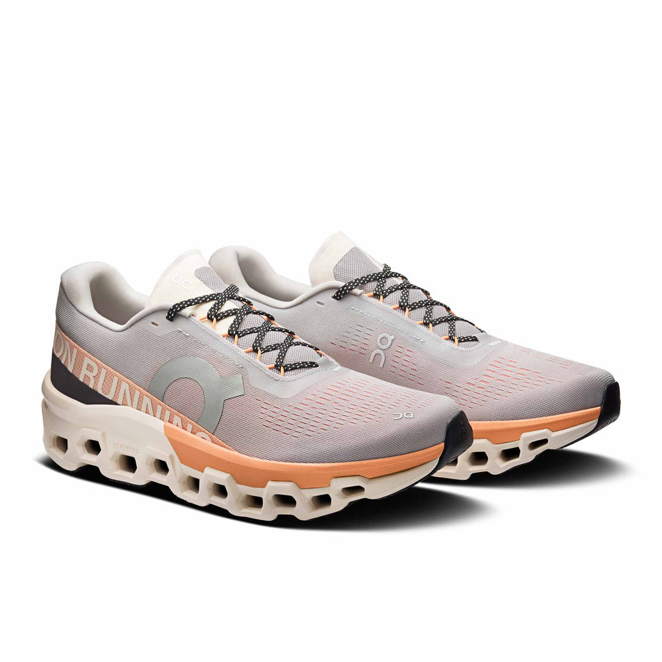 A pair of On Men's Cloudmonster 2 Running Shoes in the Glacier/Tangerine colourway. (8714506862754)