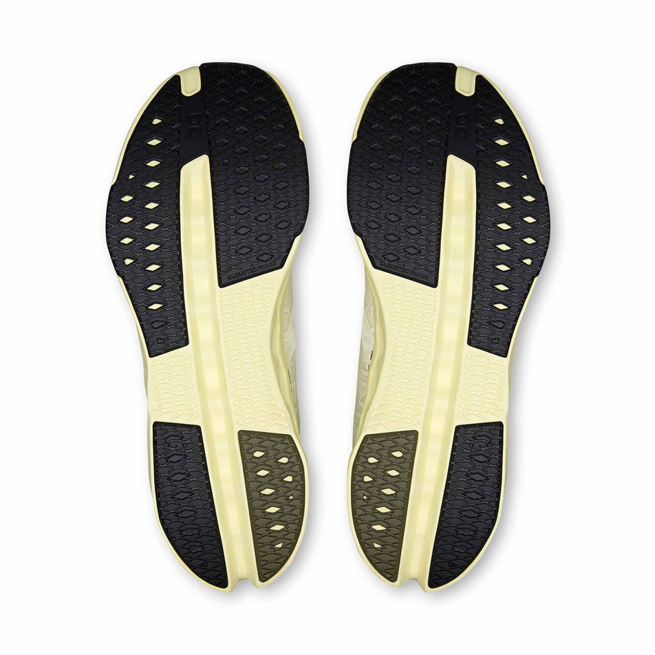 The outsoles of a pair of On Men's Cloudsurfer Next Running Shoes in the Seedling/Seedling colourway.