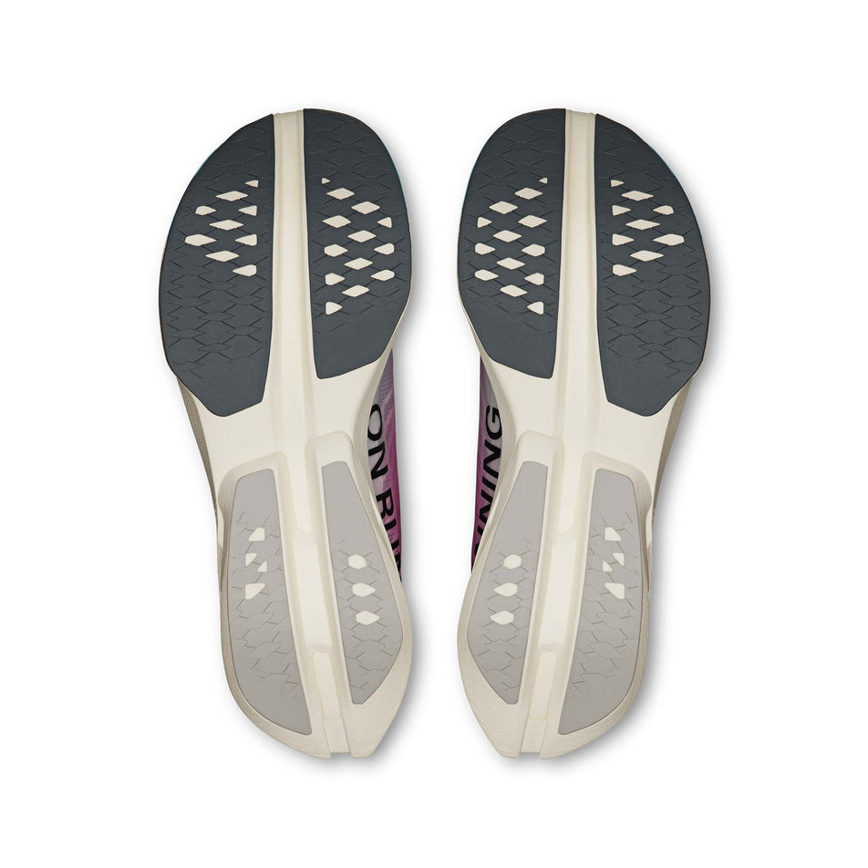 The outsoles of a pair of On Men's Cloudboom Strike Running Shoes in the White/Horizon colourway. (8714451910818)