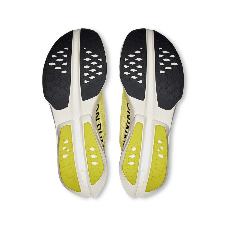 The outsoles on a pair of On Men's Cloudboom Strike Running Shoes in the Limelight/Wolf colourway. (8577818132642)