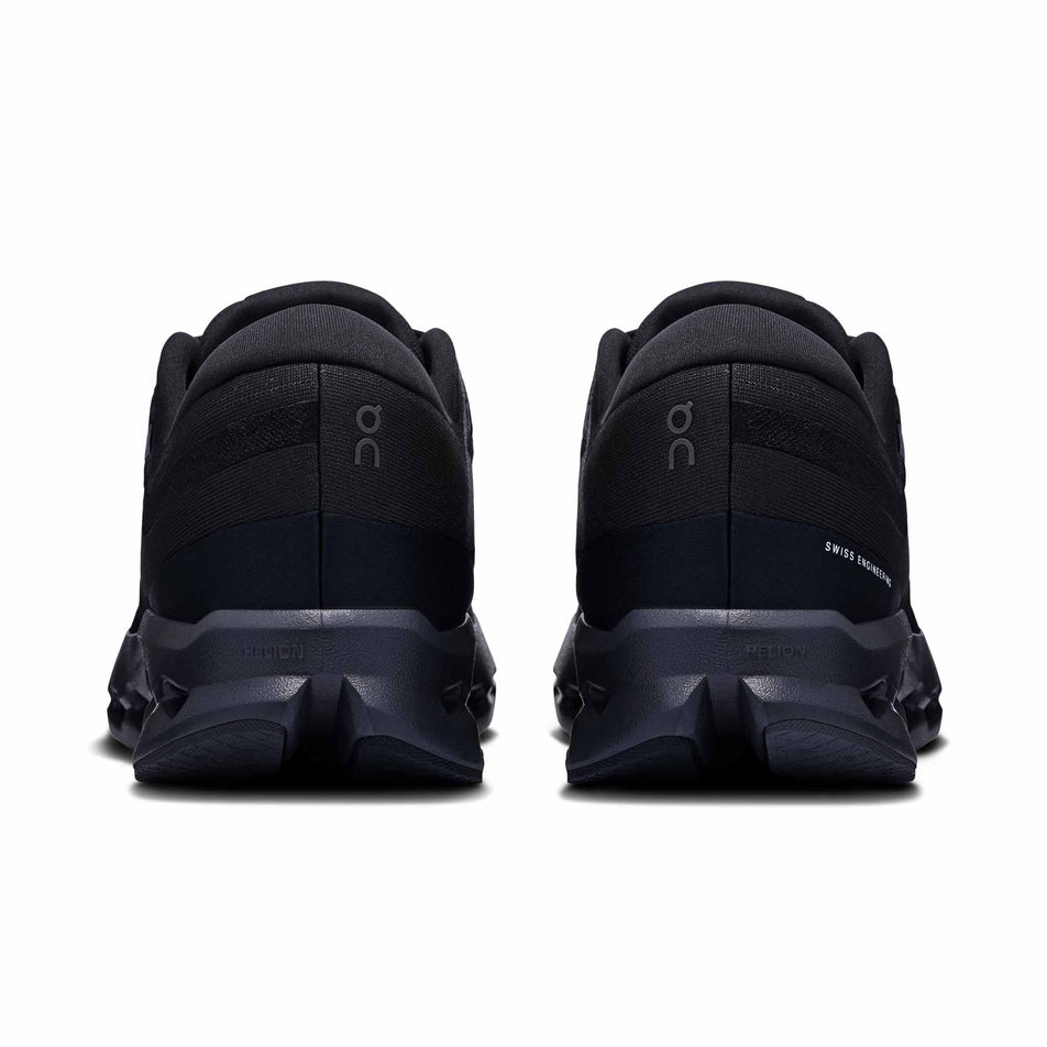 The back of a pair of On Men's Cloudsurfer 2 Running Shoes in the Black/Black colourway. (8577823441058)