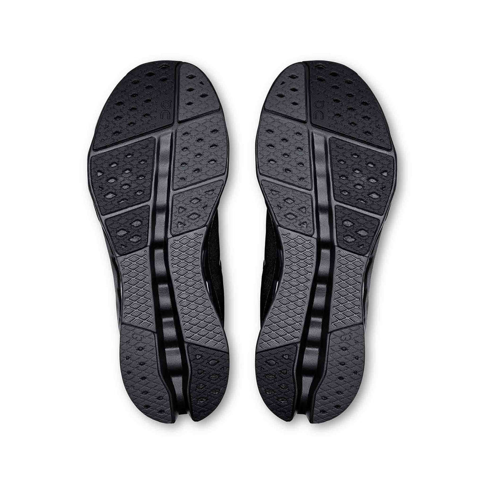 The outsoles on a pair of On Men's Cloudsurfer 2 Running Shoes in the Black/Black colourway. (8577823441058)