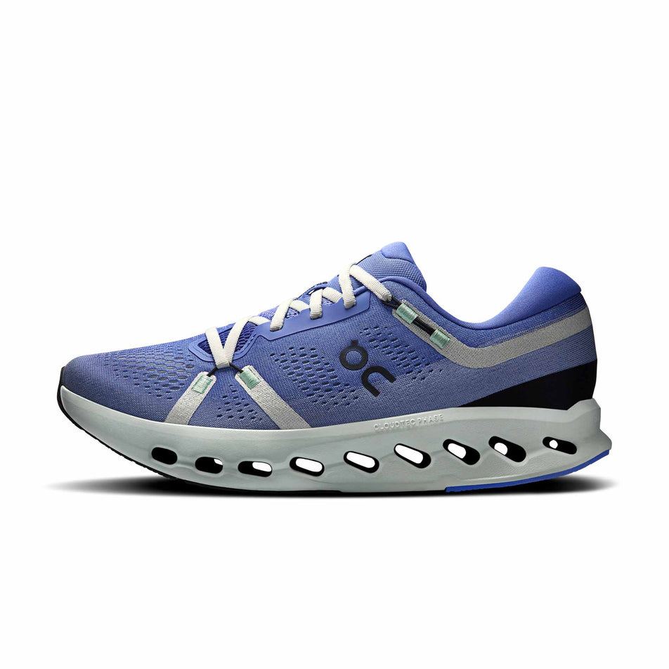 Medial view of the right shoe from a pair of On Men's Cloudsurfer 2 Running Shoes in the Sailor/Ivory colourway.