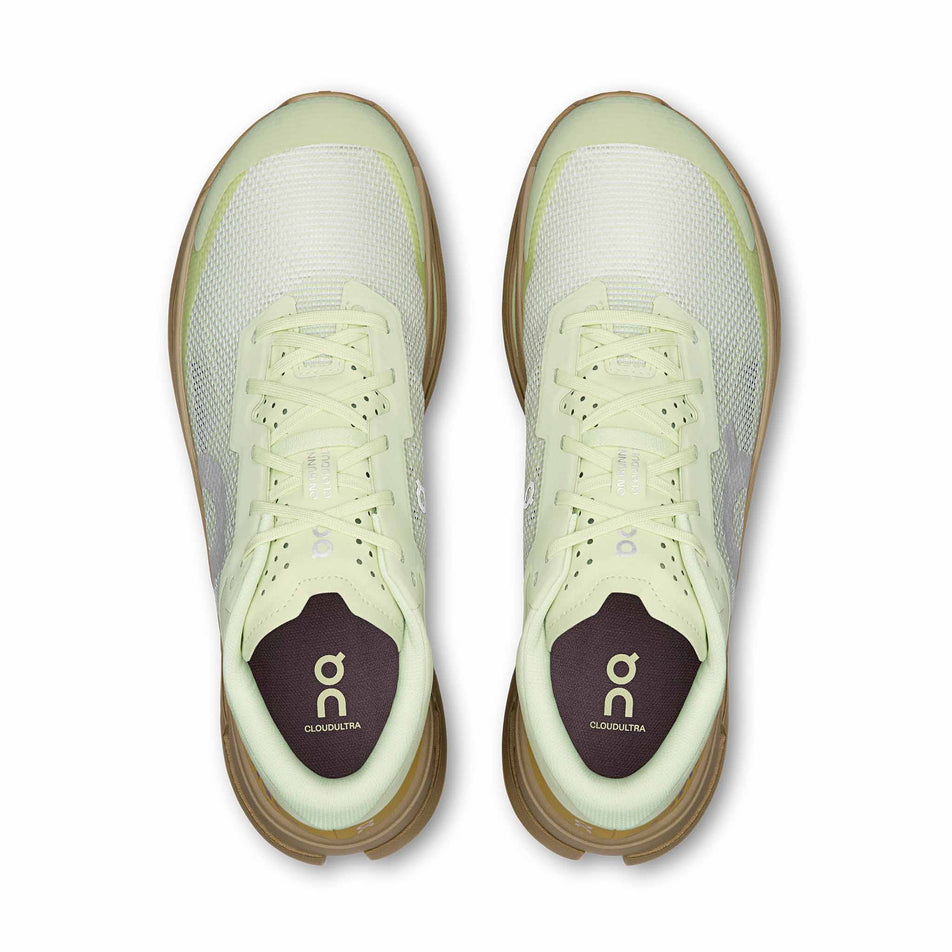 The uppers of a pair of On Men's Cloudultra 3 Running Shoes in the Linen/Safari colourway.