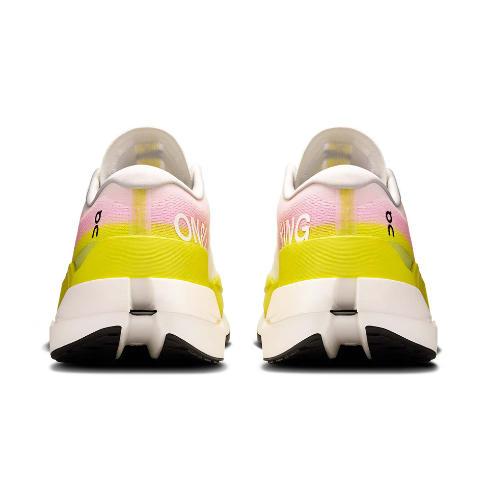 The back of a pair of On Men's Cloudboom Max Running Shoes in the Lime/Raspberry colourway. (8746021683362)