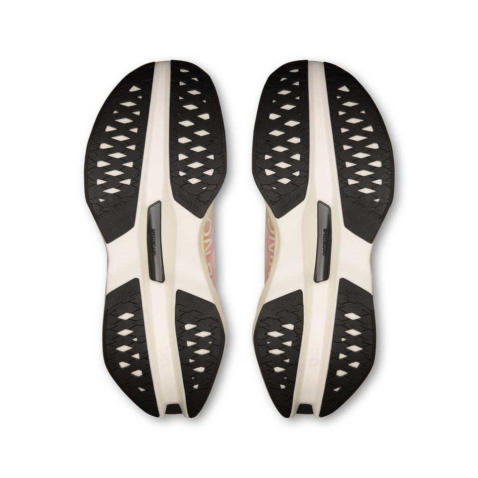 The outsoles of a pair of On Men's Cloudboom Max Running Shoes in the Lime/Raspberry colourway. (8746021683362)