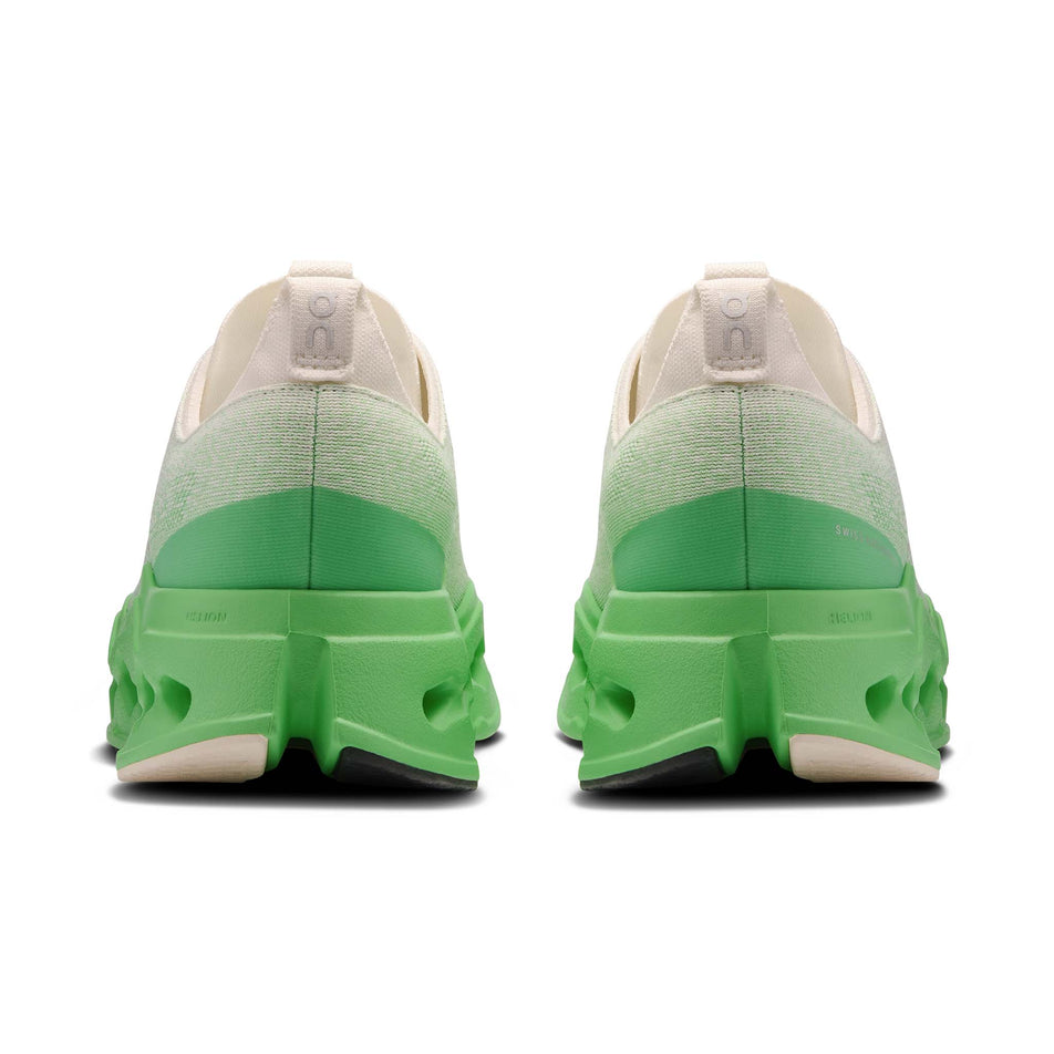 The back of a pair of On Men's Cloudsurfer Max Running Shoes in the Ivory/Honeydew colourway. (8714490314914)