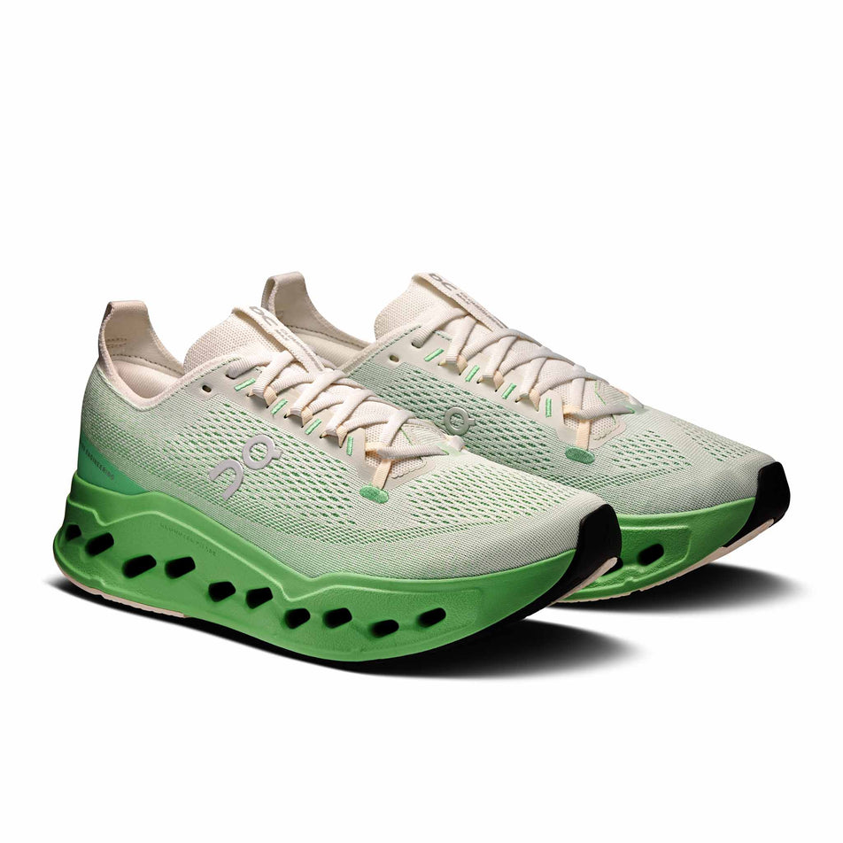 A pair of On Men's Cloudsurfer Max Running Shoes in the Ivory/Honeydew colourway. (8714490314914)