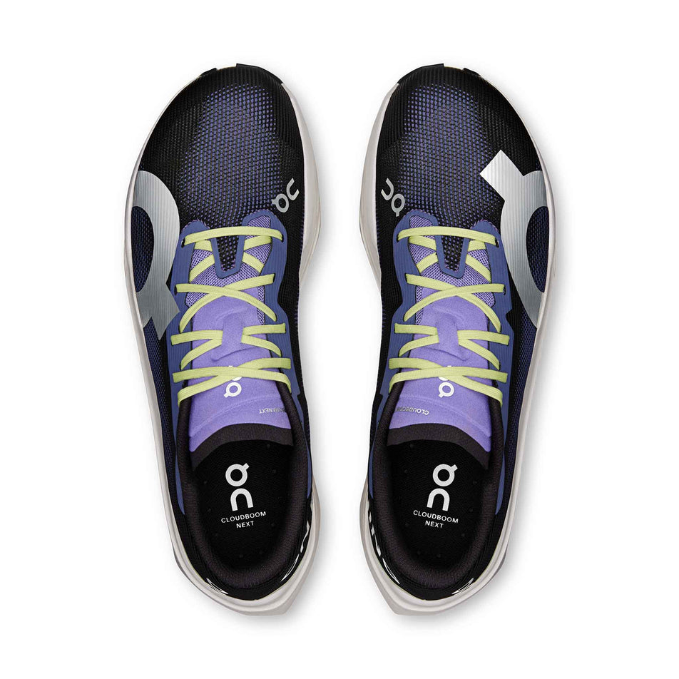 The uppers of a pair of On Men's Cloudboom Volt Running Shoes in the Black/Juniper colourway.