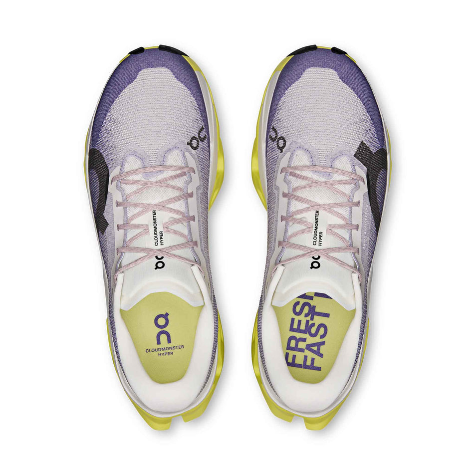 The uppers of a pair of On Men's Cloudmonster 3 Hyper Running Shoes in the Lily/Limelight colourway.
