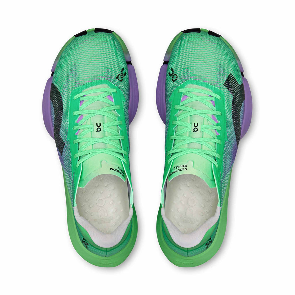 The uppers of a pair of On Unisex Cloudboom Strike 2 Running Shoes in the Verdite/Aconite colourway.