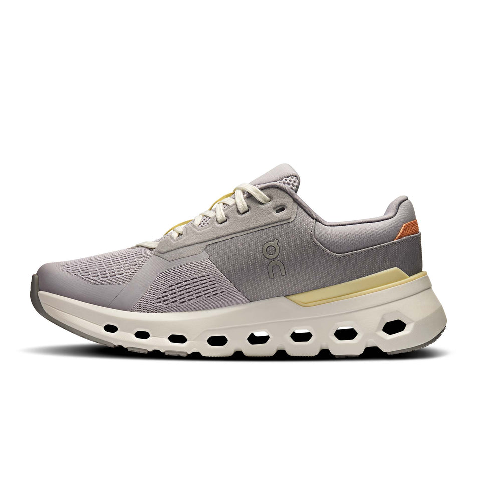 Medial view of the right shoe from a pair of On Women's Cloudrunner 2 Running Shoes in the Lilac/Ivory colourway. (8714536845474)