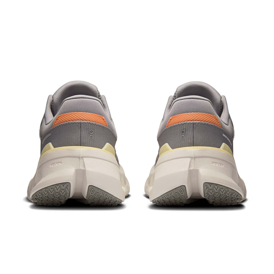 The back of a pair of On Women's Cloudrunner 2 Running Shoes in the Lilac/Ivory colourway. (8714536845474)