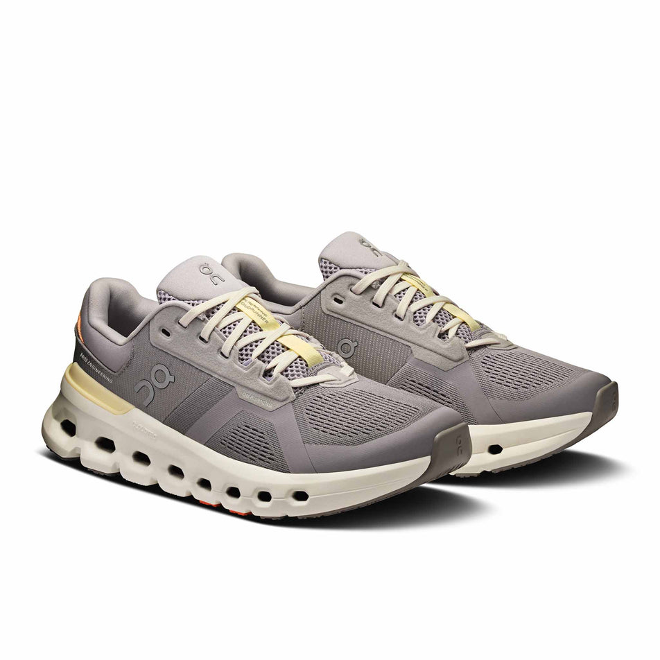 A pair of On Women's Cloudrunner 2 Running Shoes in the Lilac/Ivory colourway. (8714536845474)