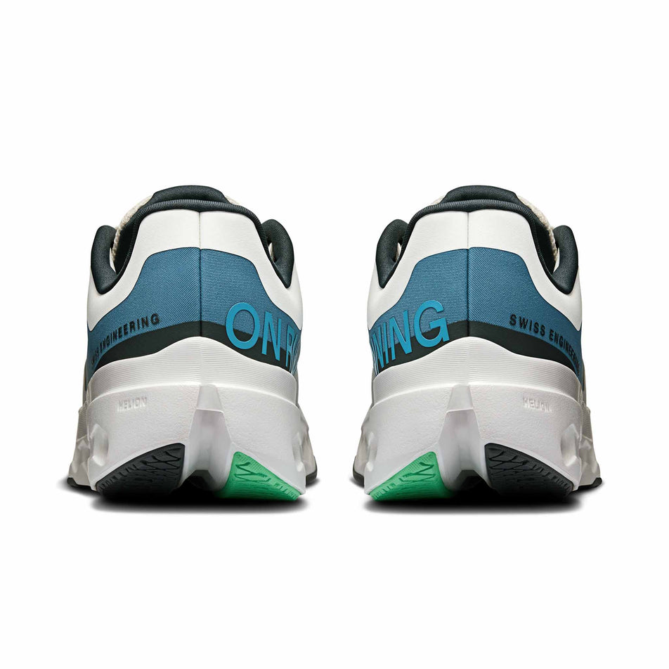 The back of a pair of On Women's Cloudsurfer Next Running Shoes in the Niagara/White colourway. (8562843549858)