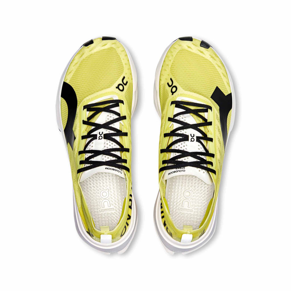 The uppers on a pair of On Women's Cloudboom Strike Running Shoes in the Limelight/Wolf colourway. (8577861386402)