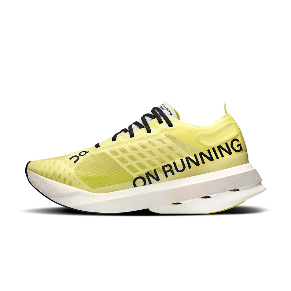 Medial view of the right shoe from a pair of On Women's Cloudboom Strike Running Shoes in the Limelight/Wolf colourway. (8577861386402)