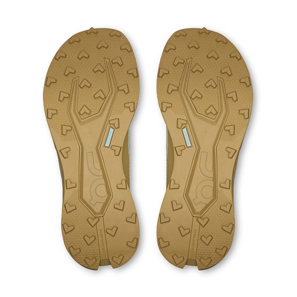 The outsole of a pair of On Women's Cloudultra 3 Running Shoes in the Linen/Safari colourway.