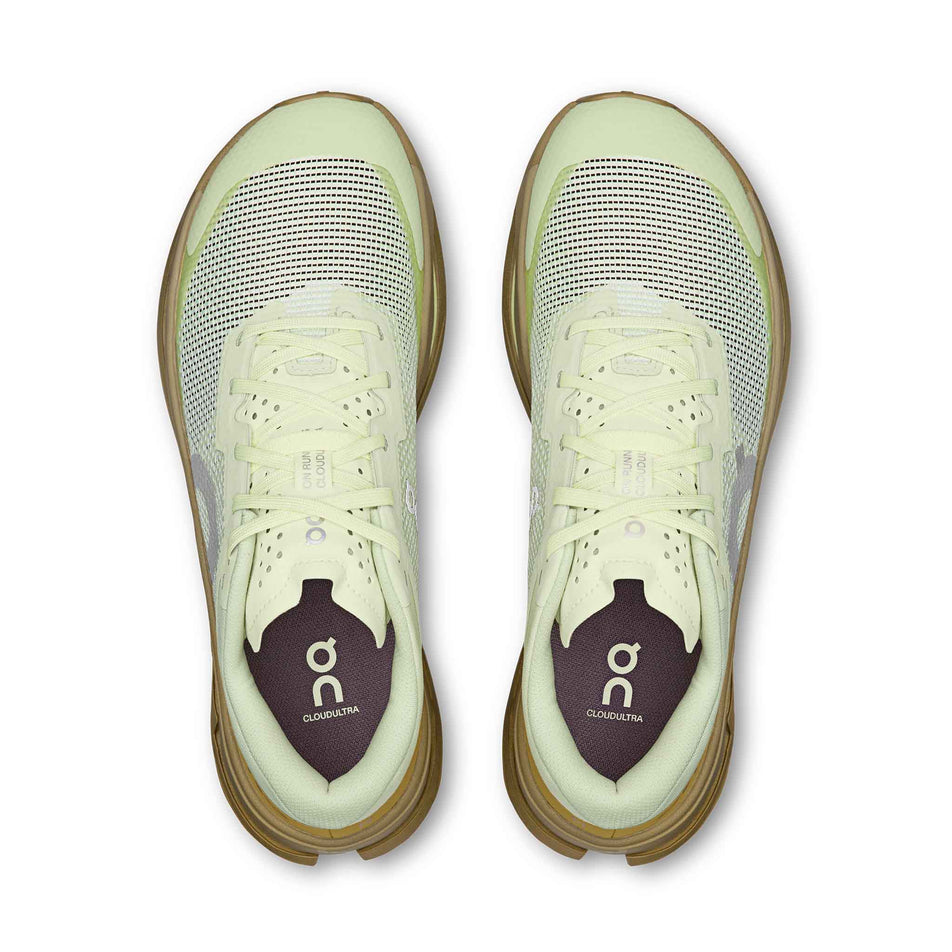 The uppers of a pair of On Women's Cloudultra 3 Running Shoes in the Linen/Safari colourway.