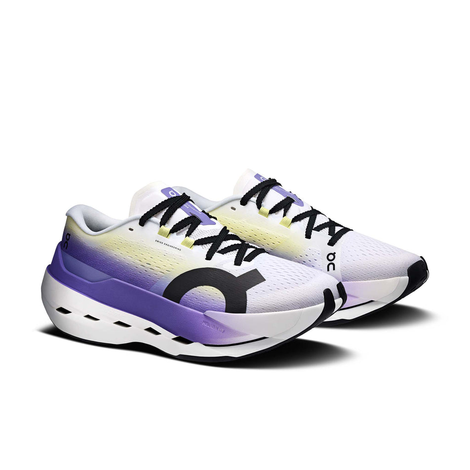 A pair of On Women's Cloudboom Max Running Shoes in the White/Juniper colourway.