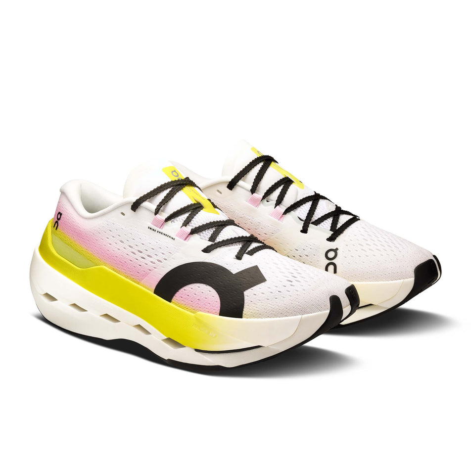 A pair of On Women's Cloudboom Max Running Shoes in the Lime/Raspberry colourway. (8746029416610)