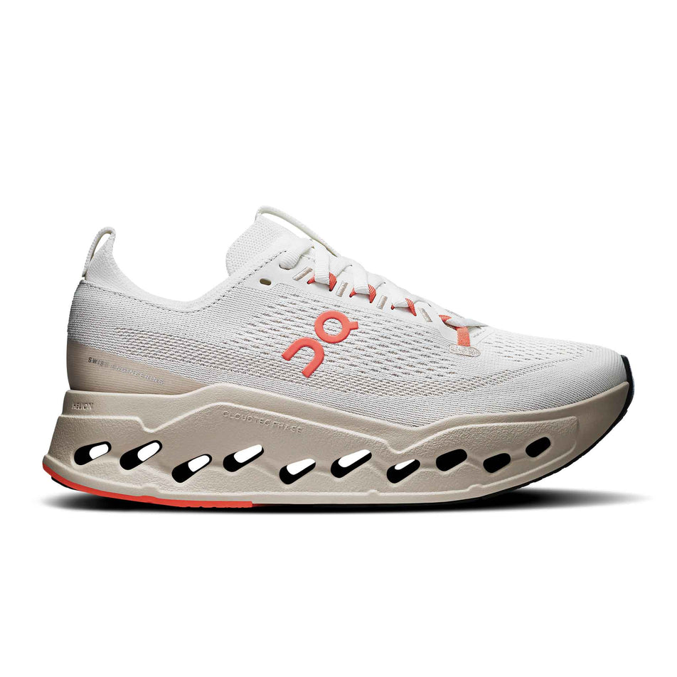 Lateral view of the right shoe from a pair of On Women's Cloudsurfer Max Running Shoes in the Ivory/Salmon colourway. (8714533634210)