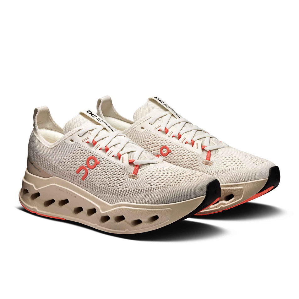 A pair of On Women's Cloudsurfer Max Running Shoes in the Ivory/Salmon colourway. (8714533634210)