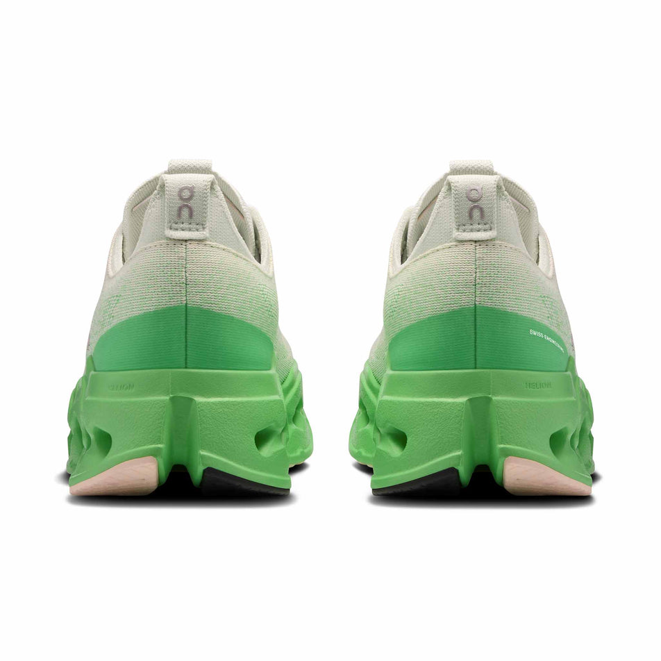The back of a pair of On Women's Cloudsurfer Max Running Shoes in the Mineral/Honeydew colourway. (8714525474978)