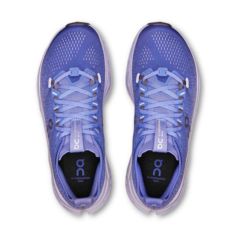 The uppers of a pair of On Women's Cloudsurfer Max Running Shoes in the Sailor/Thistle colourway.
