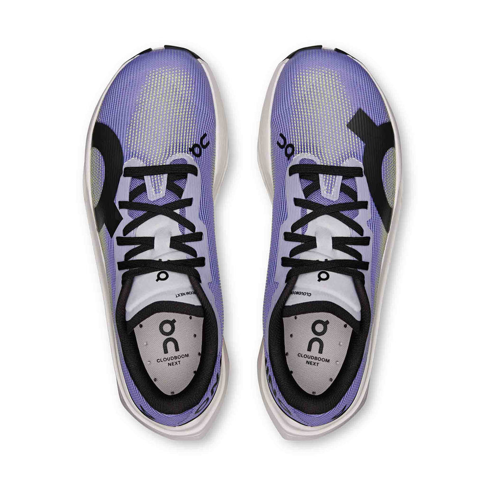 The uppers of a pair of On Women's Cloudboom Volt Running Shoes in the Juniper/Limelight colourway.