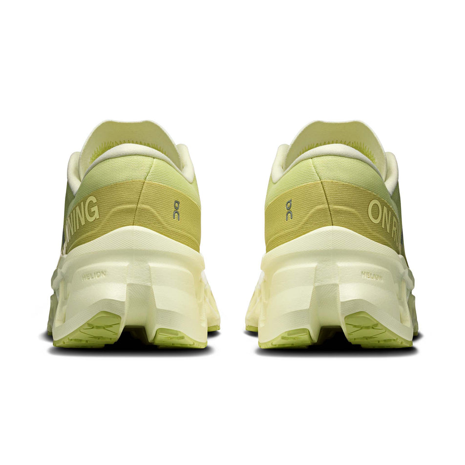 The back of a pair of On Women's Cloudmonster 3 Running Shoes in the Limelight/Seedling colourway.