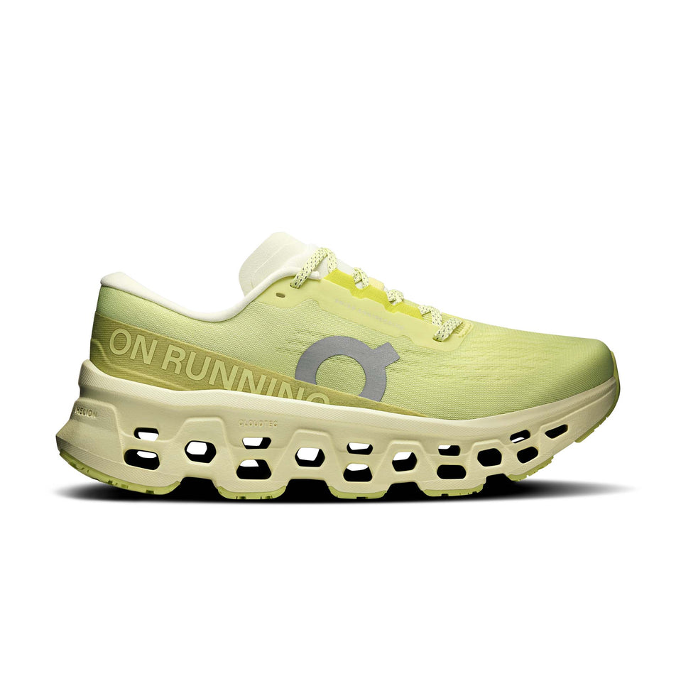 Lateral view of the right shoe from a pair of On Women's Cloudmonster 3 Running Shoes in the Limelight/Seedling colourway.