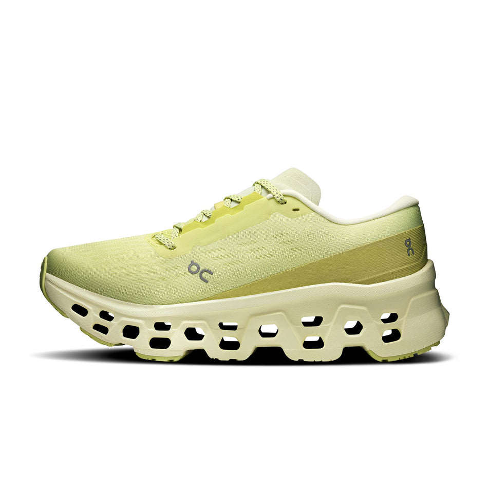 Medial view of the right shoe from a pair of On Women's Cloudmonster 3 Running Shoes in the Limelight/Seedling colourway.