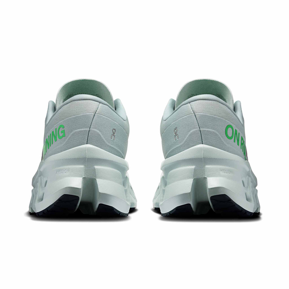 The back of a pair of On Women's Cloudmonster 3 Running Shoes in the Brook/Flurry colourway.
