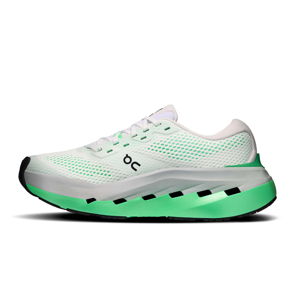 Medial view of the right shoe from a pair of On Women's Cloudrunner Max Running Shoes in the White/Verdite colourway.