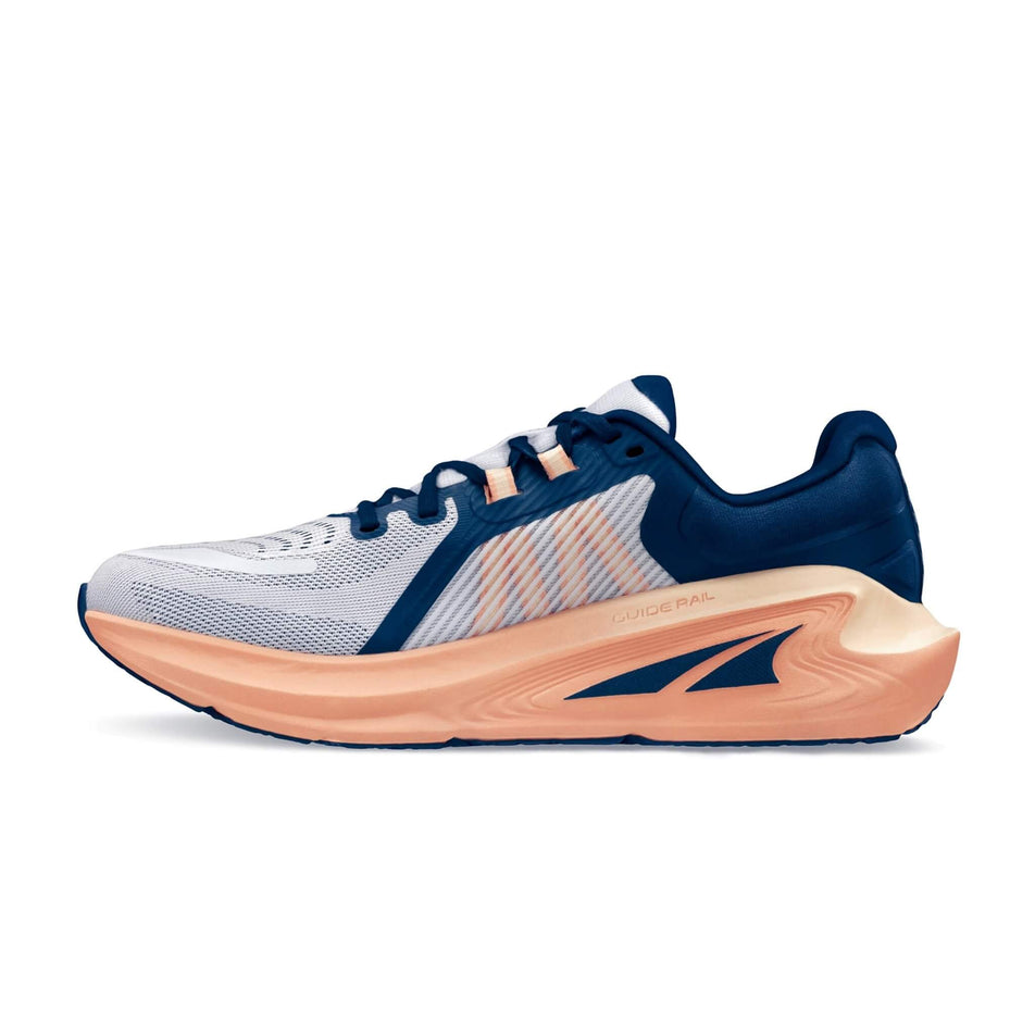 Medial side of the right shoe from a pair of Altra Women's Paradigm 7 Running Shoes in the White/Navy colourway (8405527888034)