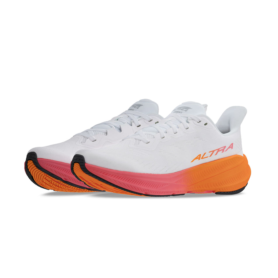 A pair of Altra Women's Experience Flow 2 Running Shoes in the White/Orange colourway. (8653253148834)