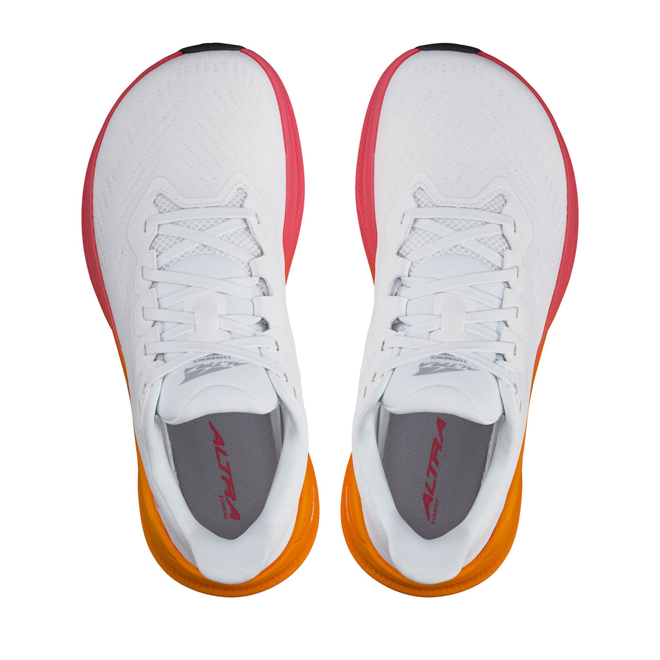 A pair of Altra Women's Experience Flow 2 Running Shoes in the White/Orange colourway. (8653253148834)