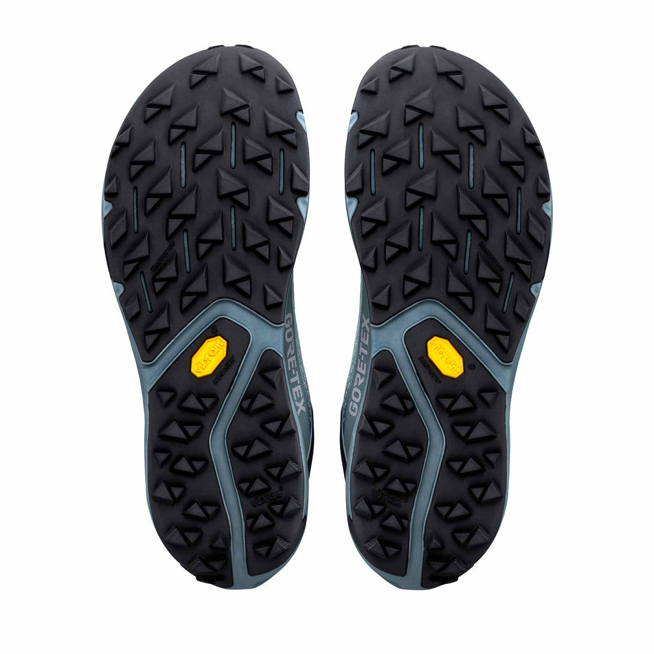 The outsoles of a pair of Altra Men's Experience Wild 3+ GTX Running Shoes in the Blue Hour/Dawn colourway.