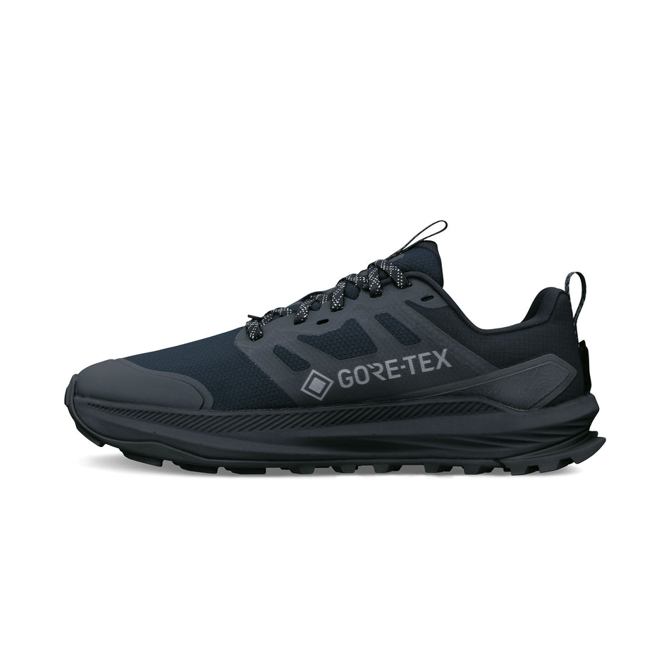 Medial view of the right shoe from a pair of Altra Women's Lone Peak 9+ GTX Running Shoes in the Black/Black colourway.